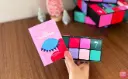 A-Person-Holding-Makeup.webp